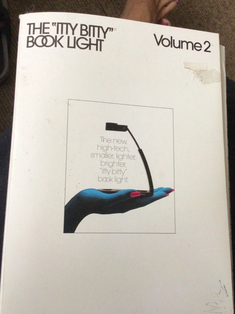 NWOT itty bitty book light vol2
